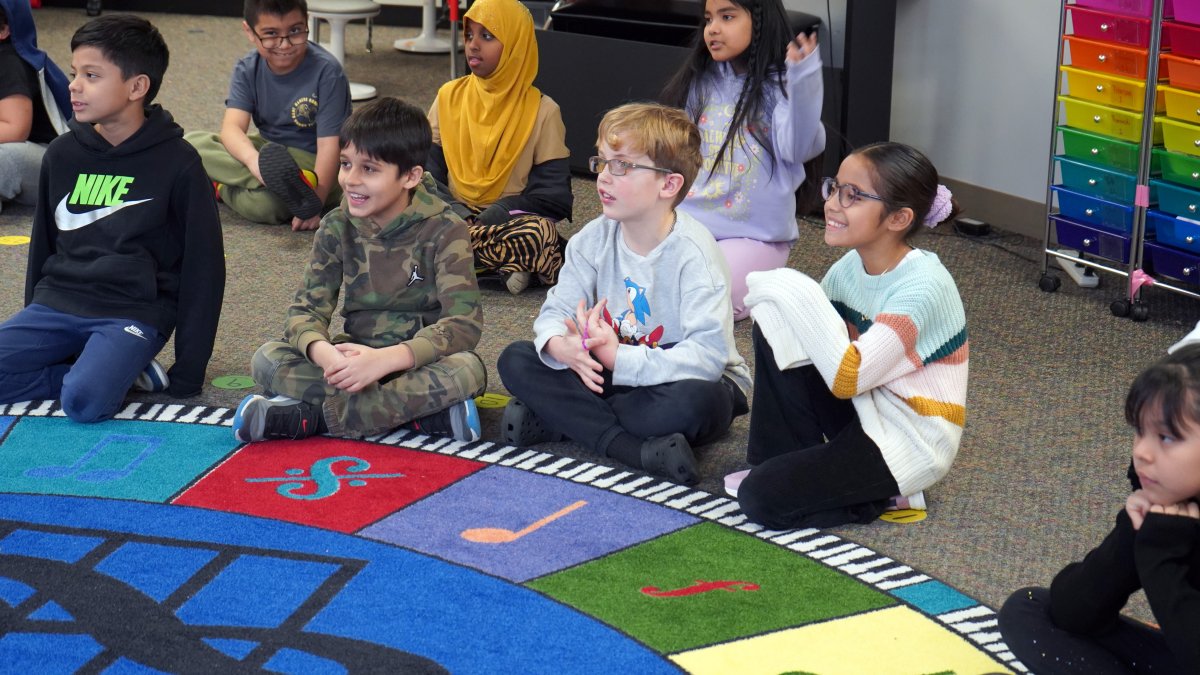 students singing in music class