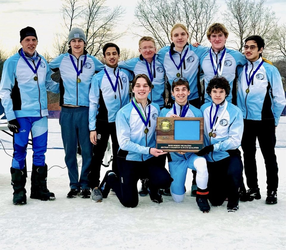 high school nordic skiiers with state meet plaque